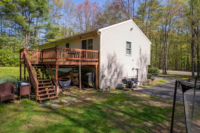 175 Blackwater Rd, Somersworth, NH 03878 - back of property with stairs, a deck, and a yard