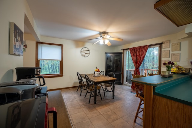 175 Blackwater Rd, Somersworth, NH 03878 - dining room with a ceiling fan, tile patterned flooring, and baseboards