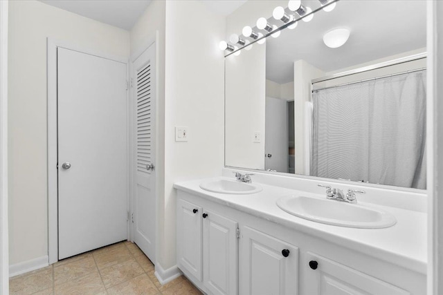 6 Roundtree Rd, Winhall, VT 05340 - full bath with double vanity and baseboards