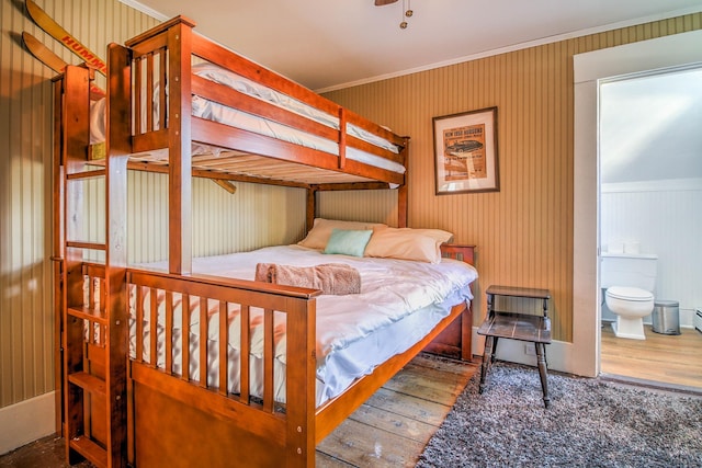 56 Andover St, Ludlow, VT 05149 - bedroom with wood finished floors, ornamental molding, and ensuite bathroom
