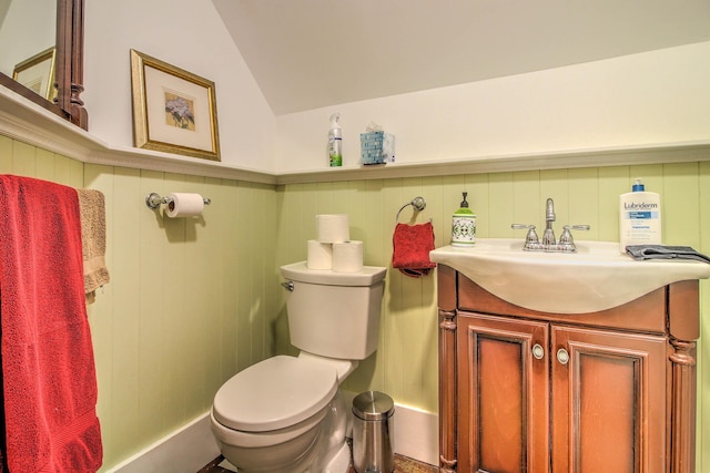 56 Andover St, Ludlow, VT 05149 - bathroom with toilet, vanity, and lofted ceiling