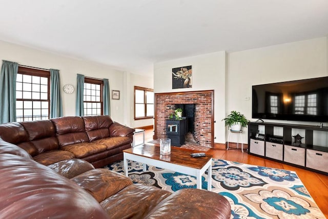 living area featuring wood finished floors and plenty of natural light