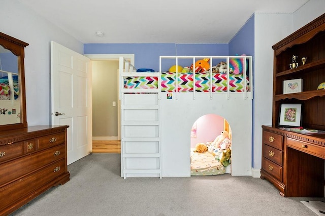 bedroom with light carpet