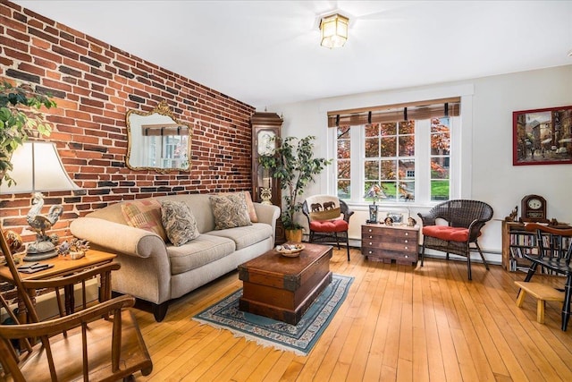 67 Kidder St, Manchester, NH 03101 - living area with wood-type flooring and brick wall