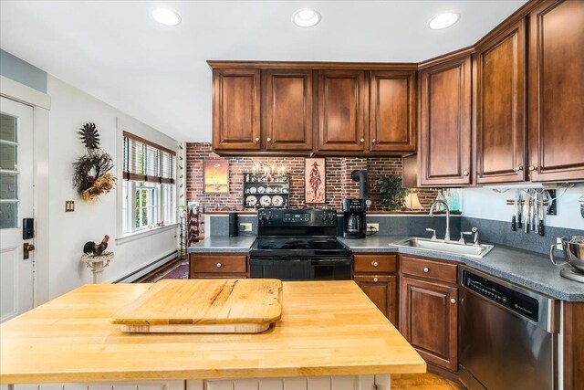 67 Kidder St, Manchester, NH 03101 - kitchen featuring dishwasher, butcher block countertops, electric range, a sink, and a baseboard heating unit