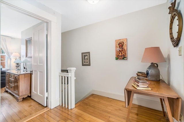 67 Kidder St, Manchester, NH 03101 - hall featuring an upstairs landing, light wood finished floors, and baseboards