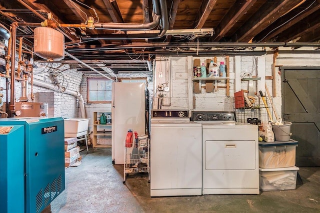 67 Kidder St, Manchester, NH 03101 - unfinished below grade area featuring independent washer and dryer