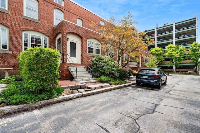 67 Kidder St, Manchester, NH 03101 - view of front of property featuring brick siding