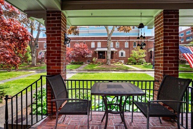 67 Kidder St, Manchester, NH 03101 - view of patio featuring a porch