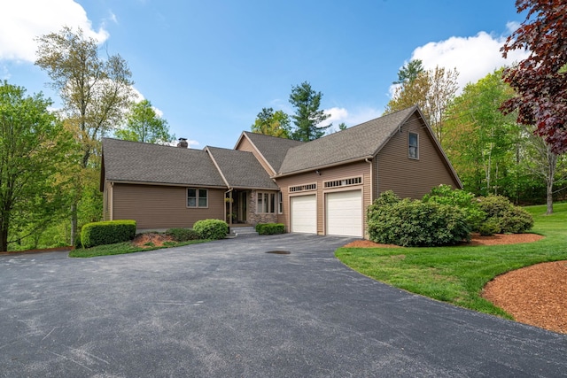 25 Golden Gate Dr, Hooksett, NH 03106 - view of front of property with driveway, an attached garage, roof with shingles, and a front yard