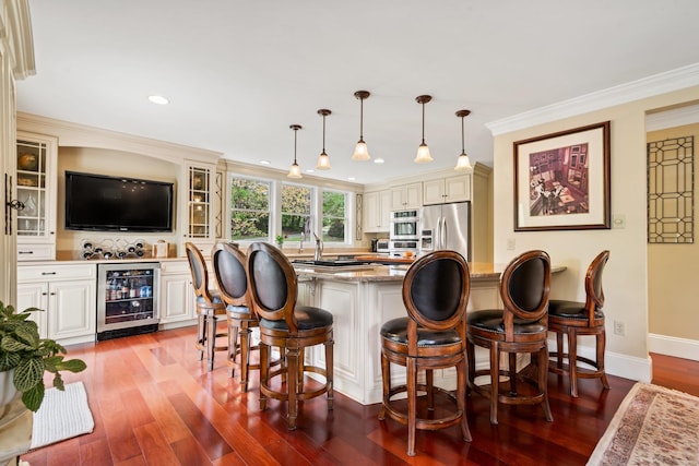 25 Golden Gate Dr, Hooksett, NH 03106 - indoor dry bar featuring beverage cooler, stainless steel fridge with ice dispenser, wood finished floors, recessed lighting, and crown molding
