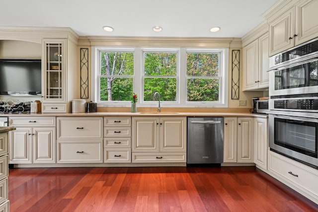 25 Golden Gate Dr, Hooksett, NH 03106 - kitchen with stainless steel appliances, a sink, and cream cabinets