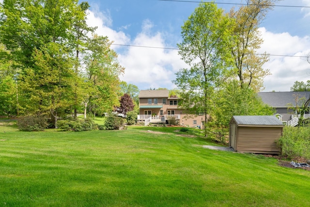 25 Golden Gate Dr, Hooksett, NH 03106 - view of grassy yard featuring a shed and an outbuilding