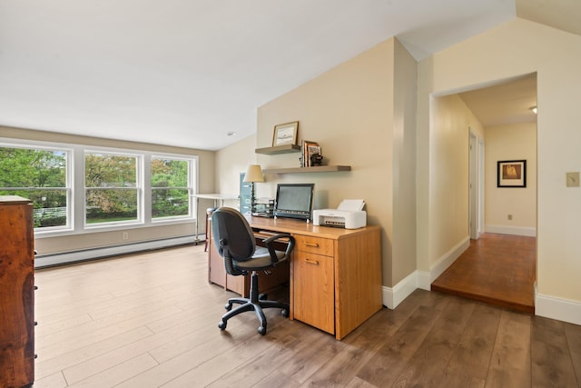 25 Golden Gate Dr, Hooksett, NH 03106 - home office with baseboard heating, wood finished floors, vaulted ceiling, and baseboards