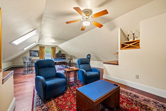 25 Golden Gate Dr, Hooksett, NH 03106 - living area featuring wood finished floors, vaulted ceiling, baseboards, and a ceiling fan
