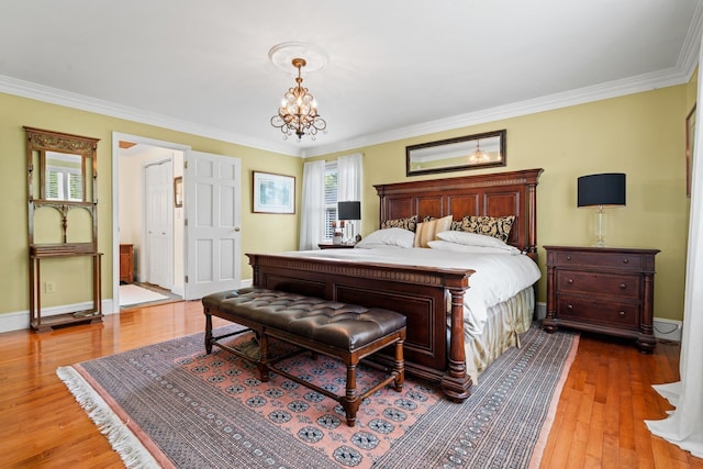25 Golden Gate Dr, Hooksett, NH 03106 - bedroom featuring wood-type flooring, a chandelier, crown molding, and baseboards