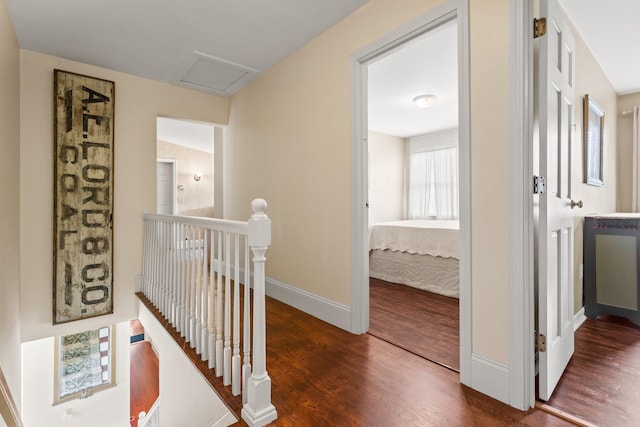 25 Golden Gate Dr, Hooksett, NH 03106 - hallway featuring an upstairs landing, wood finished floors, baseboards, and attic access