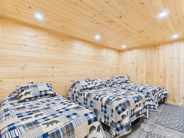 bedroom with wooden ceiling, recessed lighting, wood walls, and wood finished floors