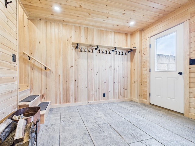 mudroom with wooden ceiling, wood walls, wood finished floors, and recessed lighting
