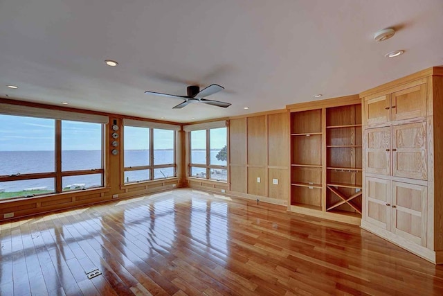 5 Great Boars Head Ave, Hampton, NH 03842 - spare room with ceiling fan, wood finished floors, a water view, a smoke detector, and recessed lighting