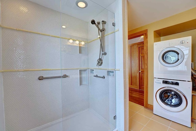 5 Great Boars Head Ave, Hampton, NH 03842 - full bathroom featuring estacked washer and dryer, a shower stall, and tile patterned flooring