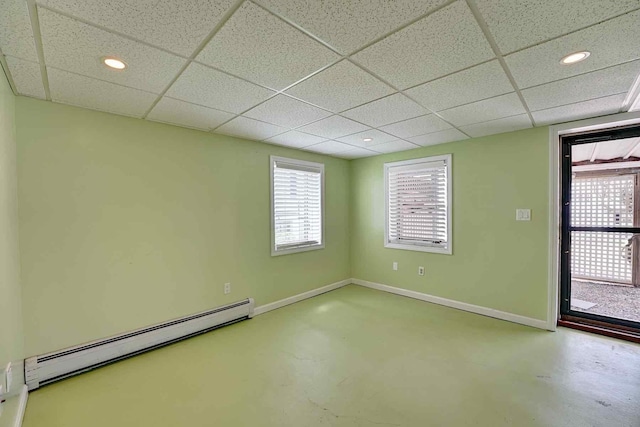 5 Great Boars Head Ave, Hampton, NH 03842 - unfurnished room featuring a baseboard heating unit, a drop ceiling, finished concrete flooring, baseboards, and recessed lighting
