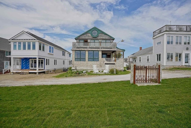 5 Great Boars Head Ave, Hampton, NH 03842 - back of house with a yard and a balcony