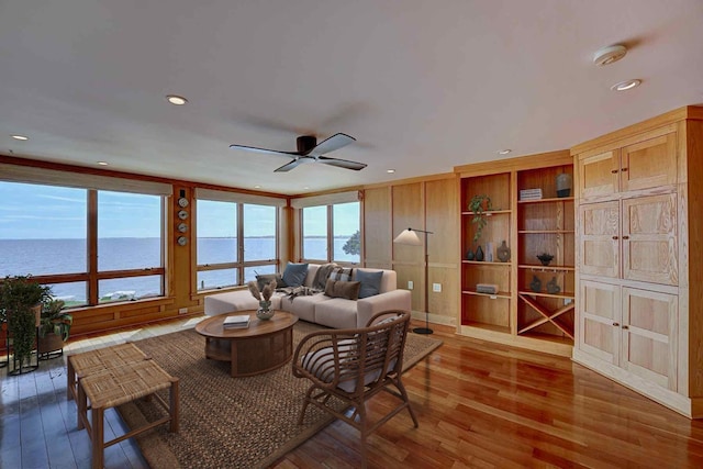 5 Great Boars Head Ave, Hampton, NH 03842 - living area with hardwood / wood-style floors, ceiling fan, healthy amount of natural light, and a water view