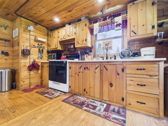 kitchen with light countertops, light wood finished floors, wooden ceiling, electric range, and a sink