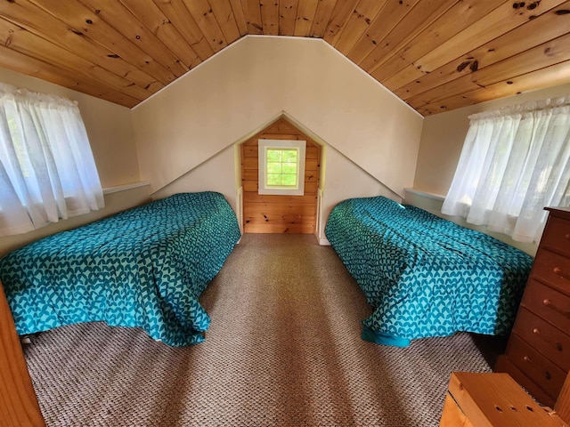 bedroom featuring wooden ceiling, carpet, and vaulted ceiling