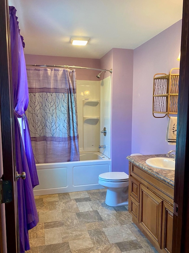 1810 Vt Route 102, Canaan, VT 05903 - full bathroom featuring shower / bath combination with curtain, vanity, toilet, and stone finish flooring