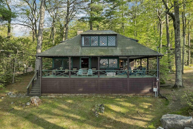 148 Lucerne Ave Unit 15, Laconia, NH 03246 - rear view of house with a chimney and a porch