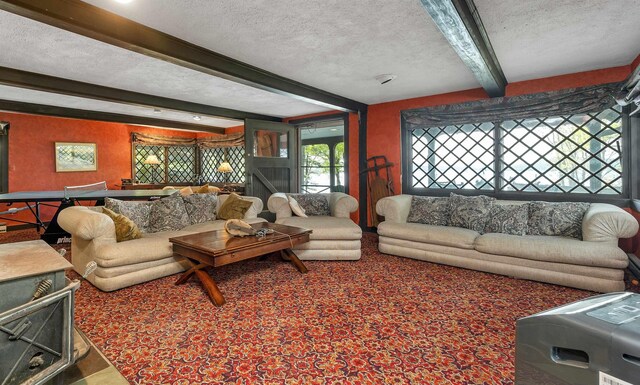 148 Lucerne Ave Unit 15, Laconia, NH 03246 - living room featuring beamed ceiling and a textured ceiling