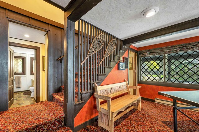 148 Lucerne Ave Unit 15, Laconia, NH 03246 - staircase featuring a textured ceiling