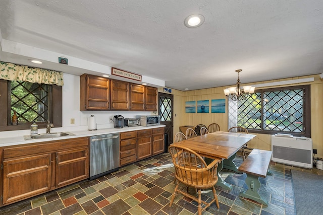 148 Lucerne Ave Unit 15, Laconia, NH 03246 - kitchen featuring appliances with stainless steel finishes, a sink, open shelves, a chandelier, and healthy amount of natural light