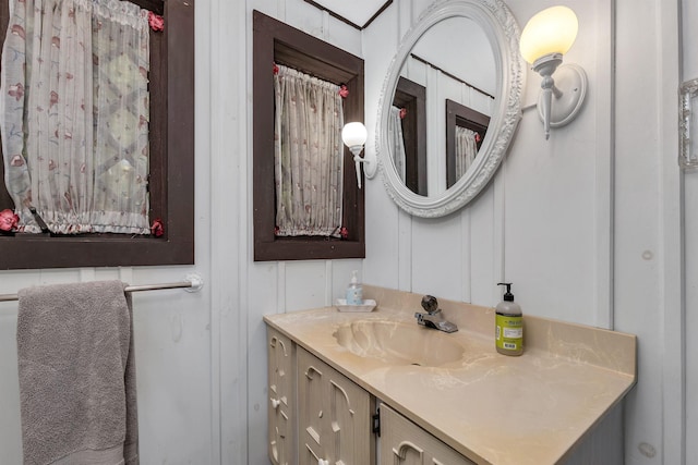 148 Lucerne Ave Unit 15, Laconia, NH 03246 - bathroom with a decorative wall and vanity