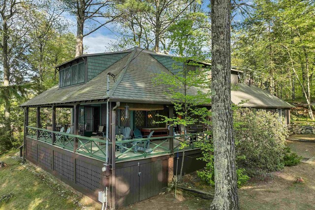 148 Lucerne Ave Unit 15, Laconia, NH 03246 - view of home's exterior featuring a deck