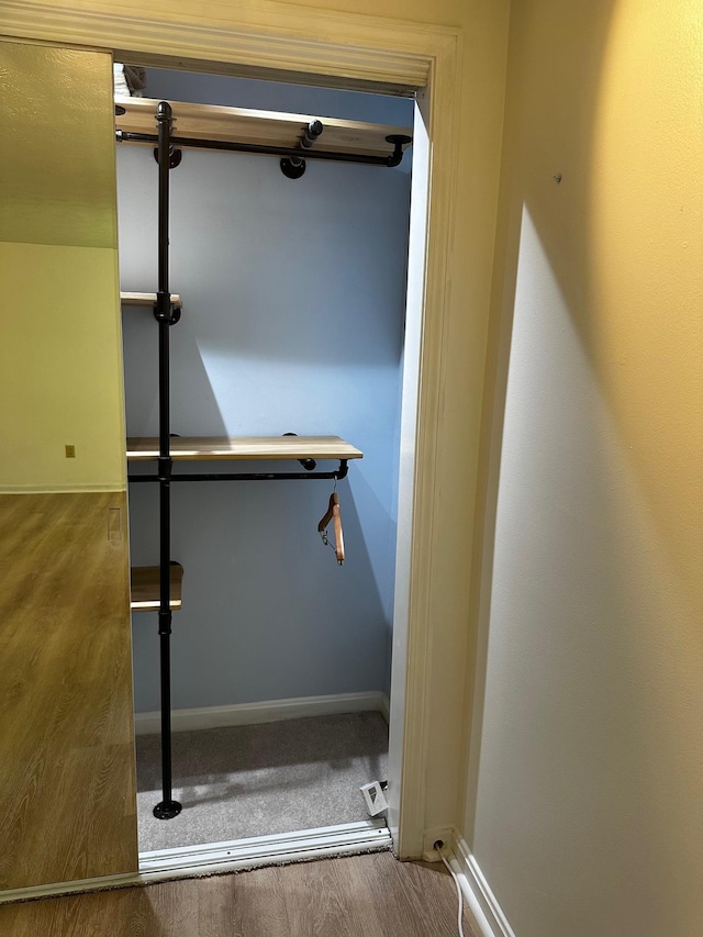 staircase featuring baseboards