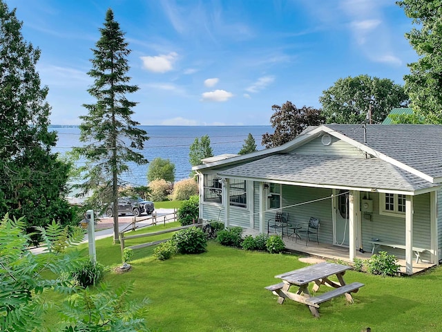 121 Platt Rd, Highgate, VT 05459 - view of front of house featuring a shingled roof, a water view, and a front yard