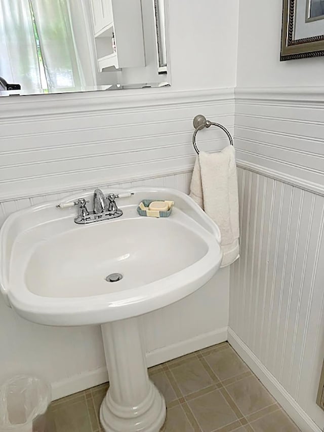 121 Platt Rd, Highgate, VT 05459 - bathroom with baseboards and a sink
