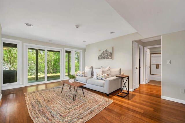 204 Chase Way, Manchester, NH 03104 - living area featuring hardwood / wood-style flooring and baseboards