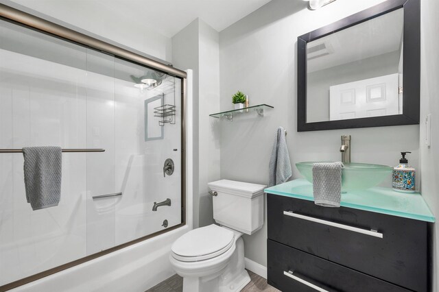 204 Chase Way, Manchester, NH 03104 - full bath featuring toilet, vanity, and combined bath / shower with glass door
