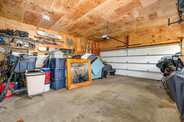204 Chase Way, Manchester, NH 03104 - garage featuring a garage door opener and wood ceiling