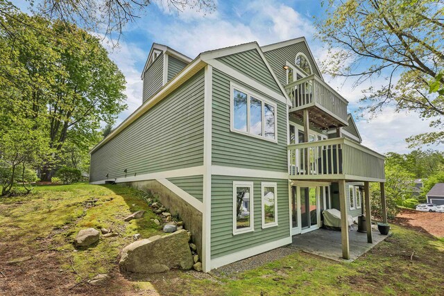 204 Chase Way, Manchester, NH 03104 - rear view of property with a balcony and a patio