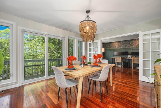 204 Chase Way, Manchester, NH 03104 - dining room featuring a chandelier and hardwood / wood-style flooring