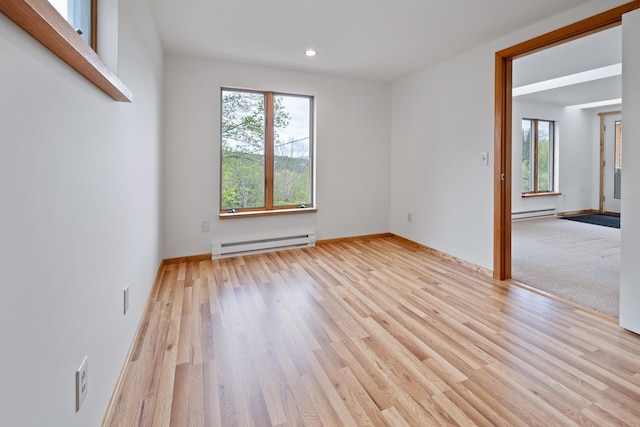 150 Stevens Rd, Lebanon, NH 03766 - unfurnished room with baseboard heating, plenty of natural light, light wood-style floors, and recessed lighting