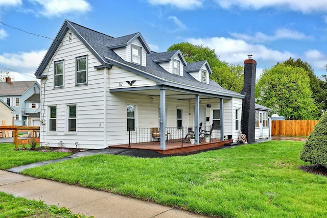 82 Forest St, Rutland City, VT 05701 - view of front facade with covered porch and a shingled roof