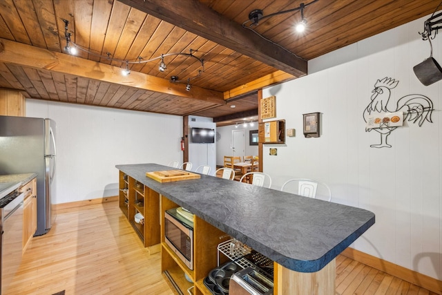 46 Crestwood Dr, Conway, NH 03860 - kitchen with appliances with stainless steel finishes, dark countertops, wooden ceiling, open shelves, and light wood finished floors