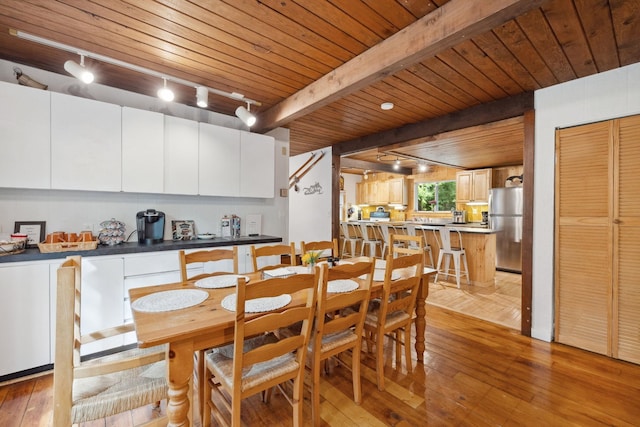 46 Crestwood Dr, Conway, NH 03860 - dining area featuring rail lighting, wood ceiling, light wood-type flooring, and beam ceiling