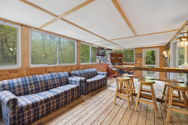 46 Crestwood Dr, Conway, NH 03860 - sunroom featuring hardwood / wood-style floors, healthy amount of natural light, wooden walls, and a wooden deck